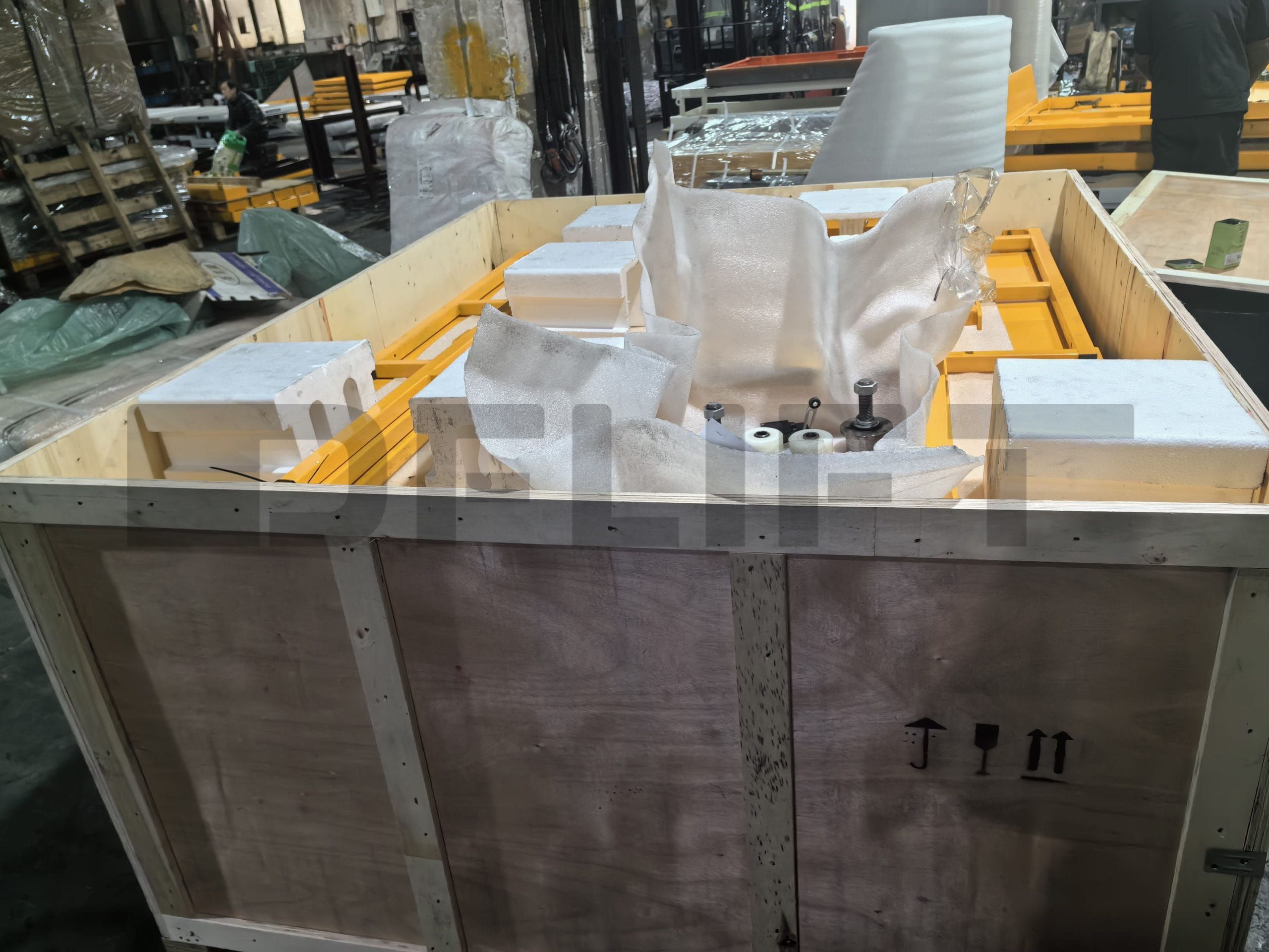 packaged of stationary scissor lift scaled